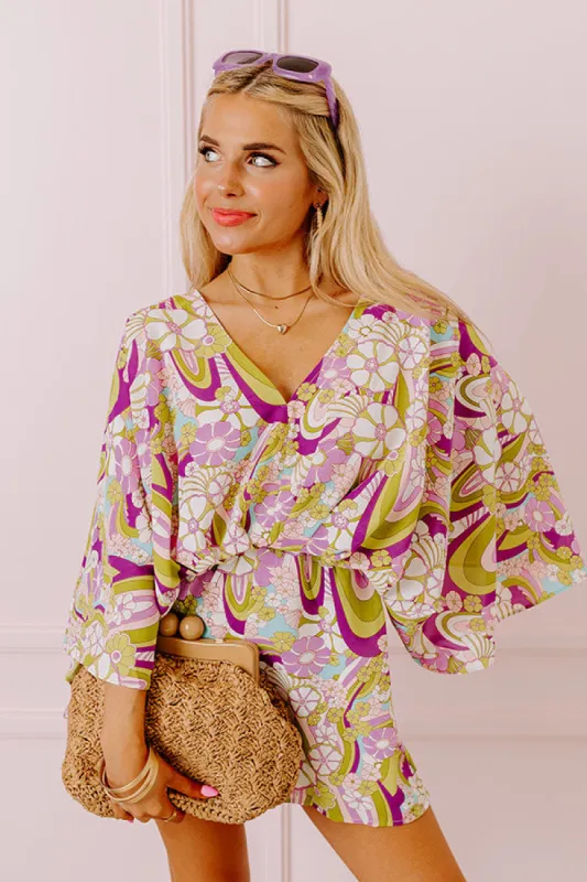 Flirty Moments Floral Romper sold by Impressions