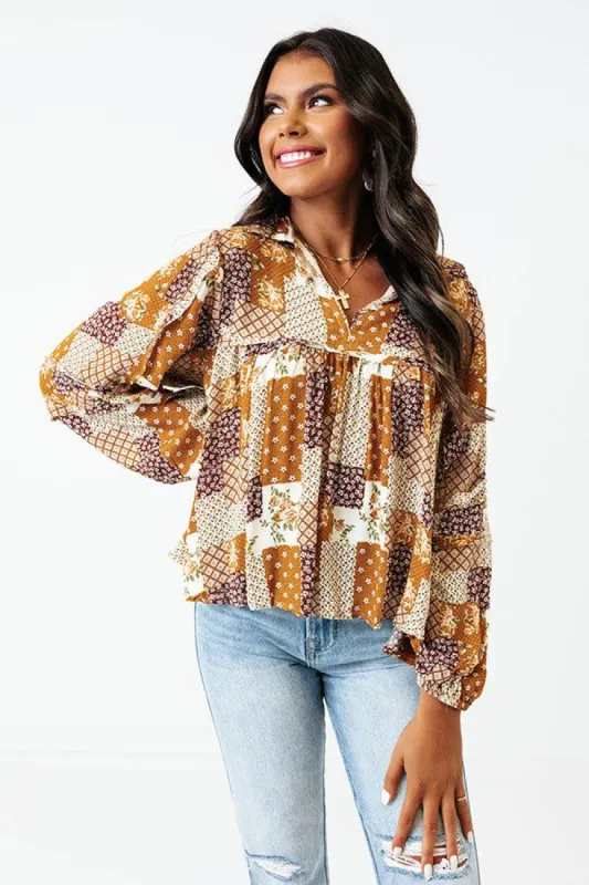 The Ivee Floral Babydoll Top in Cream sold by Impressions