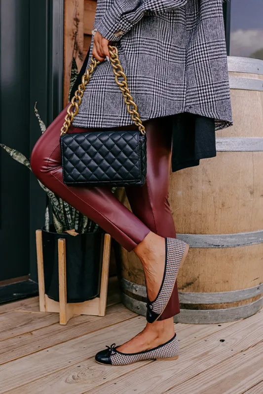 The Olivia Houndstooth Flat sold by Impressions
