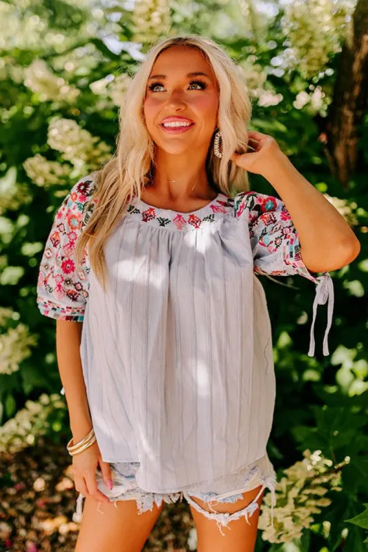 Travel To Europe Embroidered Shift Top sold by Impressions
