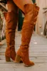 The Kinsley Faux Suede Thigh High Boot In Brown sold by Impressions