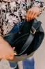 Girl On The Go Faux Leather Tote in Black sold by Impressions