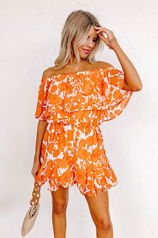 Seas The Moment Floral Romper In Orange sold by Impressions