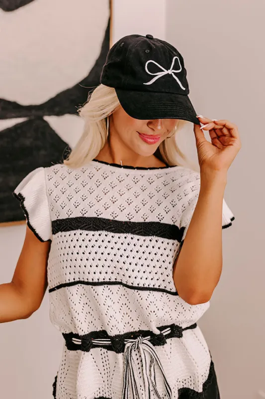 Put A Bow On It Embroidered Baseball Cap in Black sold by Impressions