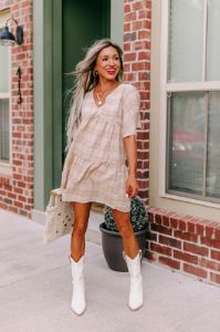 Pretty Presence Babydoll Dress In Iced Latte sold by Impressions