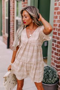 Pretty Presence Babydoll Dress In Iced Latte sold by Impressions