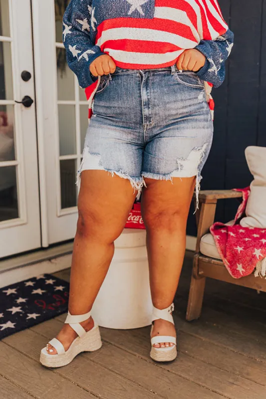 Risen Mel High Waist Distressed Shorts In Medium Wash Curves sold by Impressions