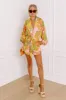 Sunny Day Stroll Floral Romper sold by Impressions