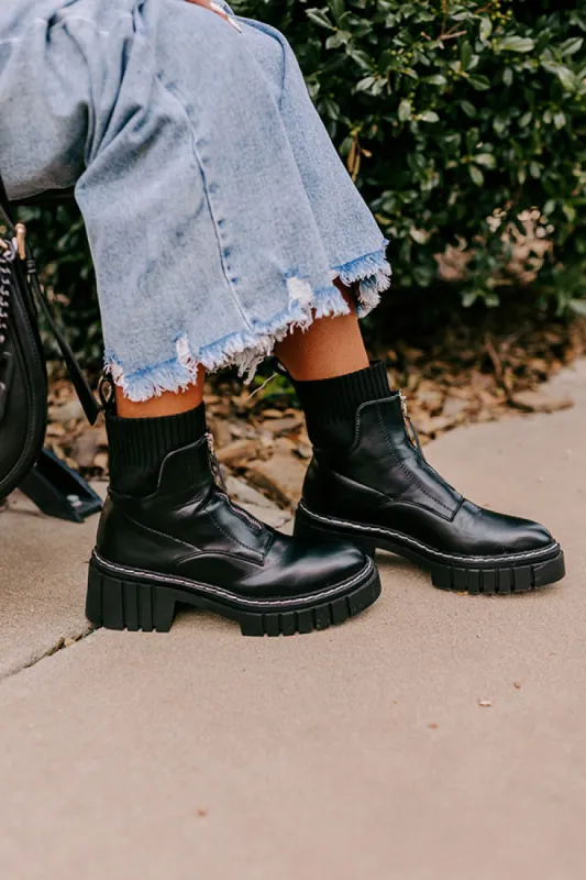 The Ashley Faux Leather Boot In Black sold by Impressions