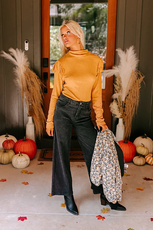 Fashionably Late Ruffle Top in Camel sold by Impressions