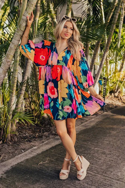 Floral Embrace Mini Dress in Navy sold by Impressions