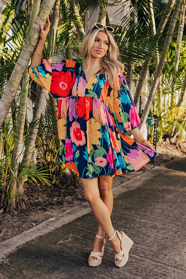 Floral Embrace Mini Dress in Navy sold by Impressions