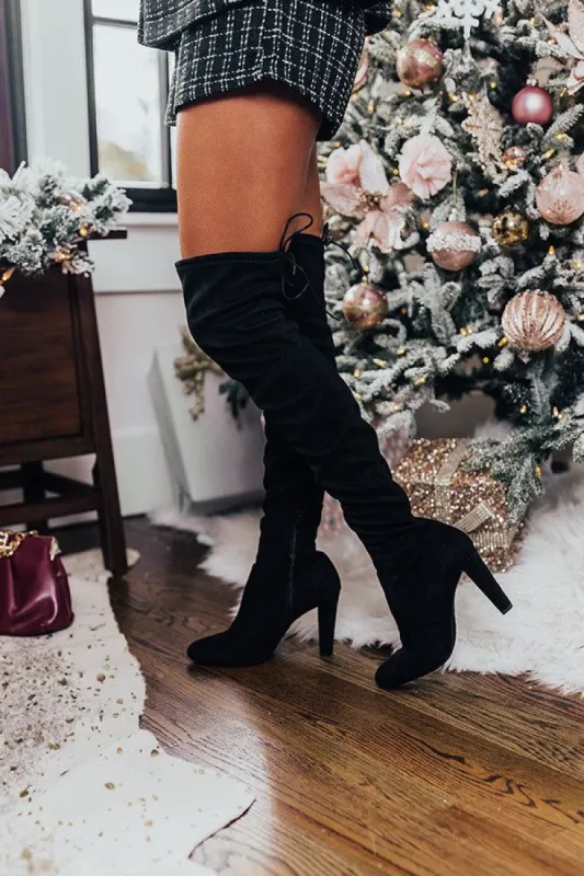 The Dreya Faux Suede Thigh High Boot In Black sold by Impressions