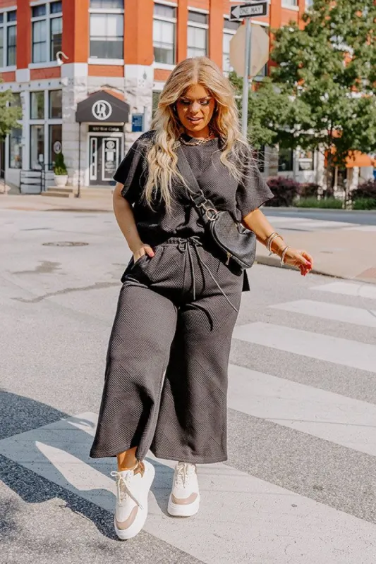 Essentially Chic Shift Top In Black Curves sold by Impressions