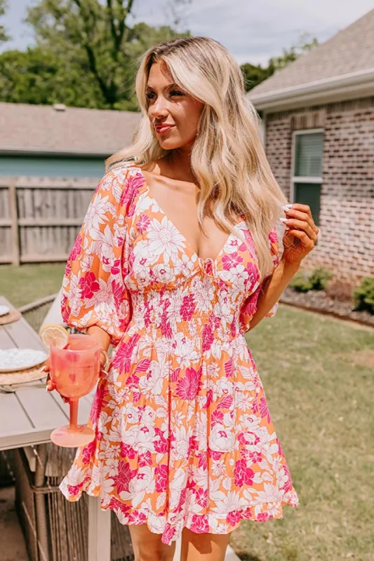 Whispering Muse Floral Mini Dress in Orange sold by Impressions