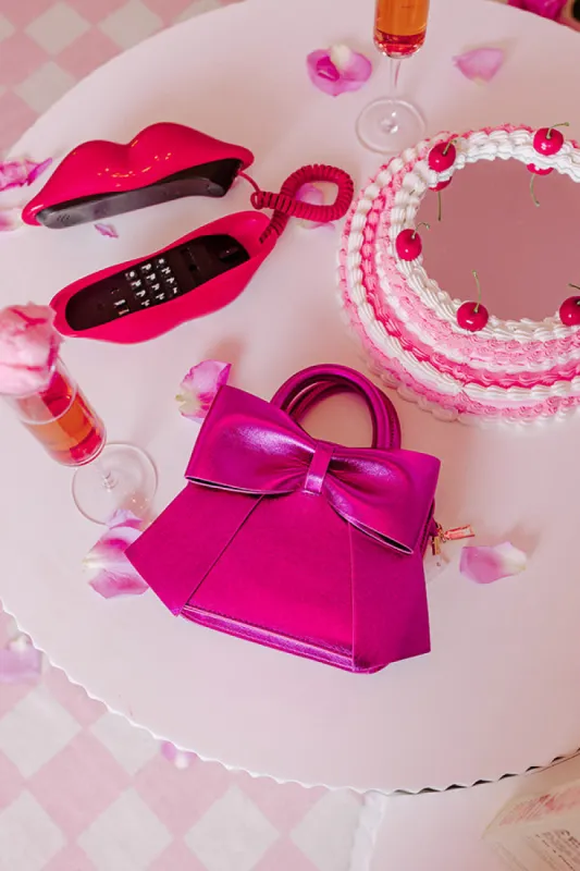 Embracing Love Purse In Fuchsia sold by Impressions