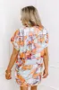 Retreat Yourself Button Up in Orange sold by Impressions