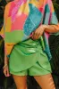 Party On The Go Skort in Kelly Green sold by Impressions