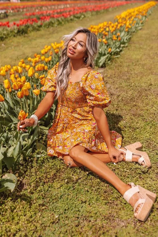 Vibrant Smiles Smocked Mini Dress sold by Impressions