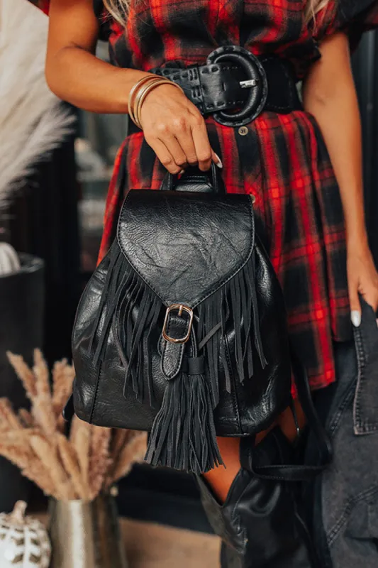 The Kenzo Faux Leather Fringe Backpack In Black sold by Impressions