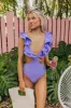 Sandy Shores Cut Out One Piece Swimsuit in Lavender sold by Impressions