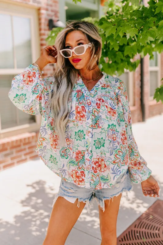 Editor In Chic Floral Button Up In Aqua sold by Impressions