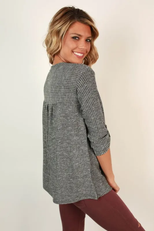 A Casual Escape Babydoll Top In Charcoal sold by Impressions