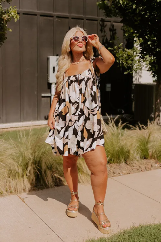 Bloom With A View Romper In Black Curves sold by Impressions