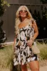 Bloom With A View Romper In Black Curves sold by Impressions