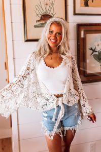 Sail The Day Away Front Tie Crochet Top in Cream sold by Impressions