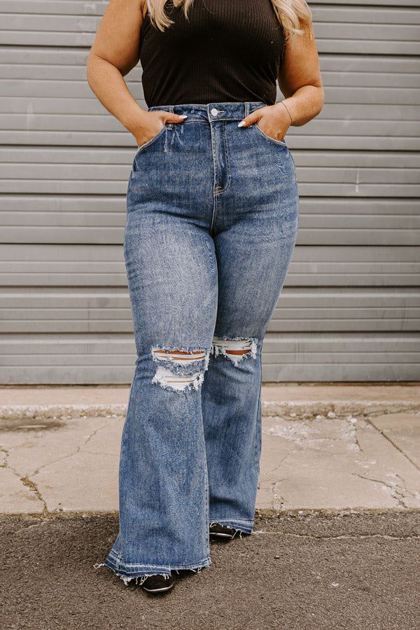 The Sequoia High Waist Distressed Flare in Dark Wash Curves sold by Impressions