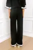 Uptown Cafe High Waist Knit Pants in Black sold by Impressions