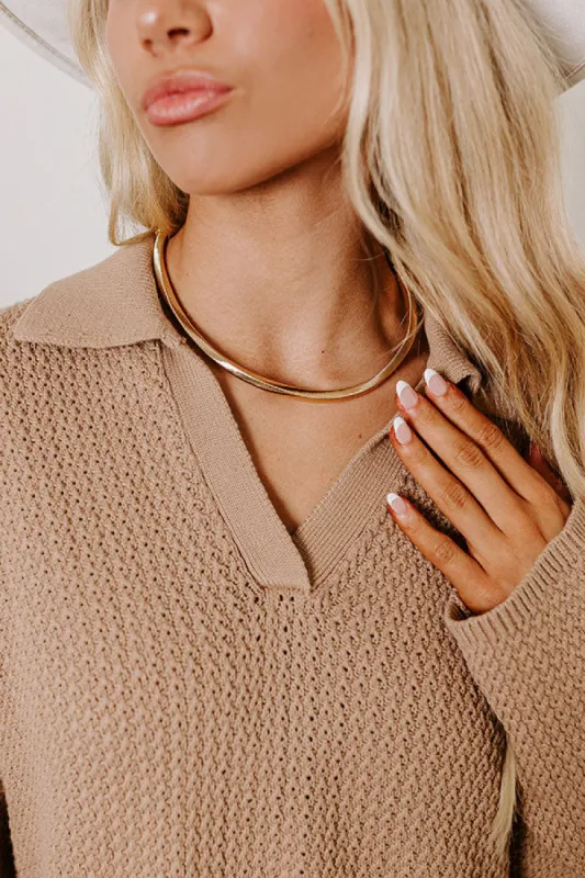 Cue The Chic Necklace in Gold sold by Impressions