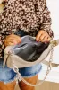 Uptown Allure Faux Leather Crossbody In Oatmeal sold by Impressions