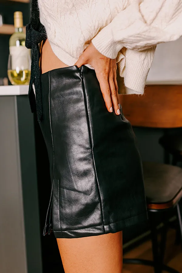 The Samara High Waist Faux Leather Skort in Black sold by Impressions product image thumbnail 3