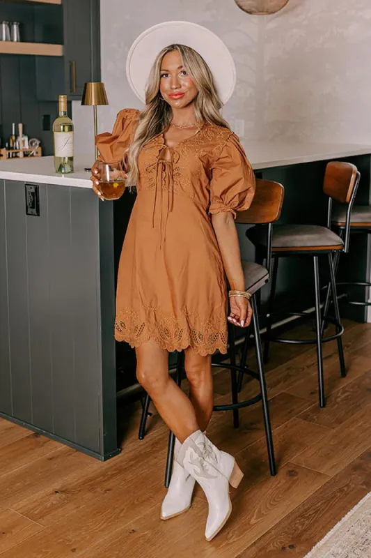 Chic Feeling Embroidered Mini Dress in Camel sold by Impressions