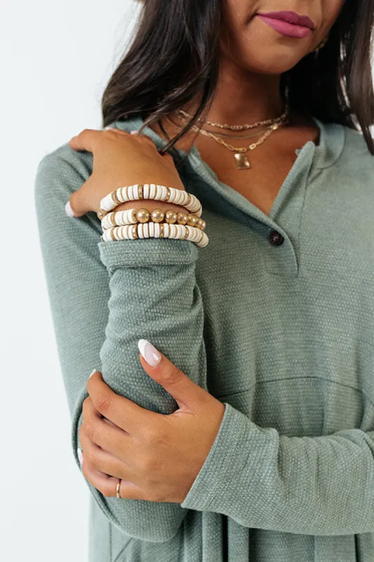 Speak Up Bracelet Set In Cream sold by Impressions