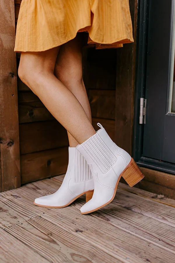 The Oaklynn Faux Leather Boot in Ivory sold by Impressions