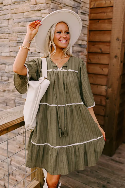Simply Lovely Tiered Mini Dress in Olive sold by Impressions