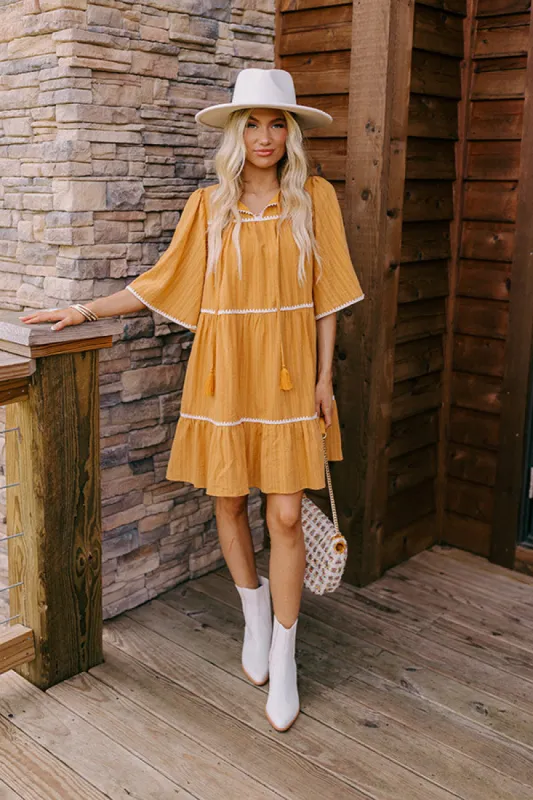 Simply Lovely Tiered Mini Dress in Mustard sold by Impressions