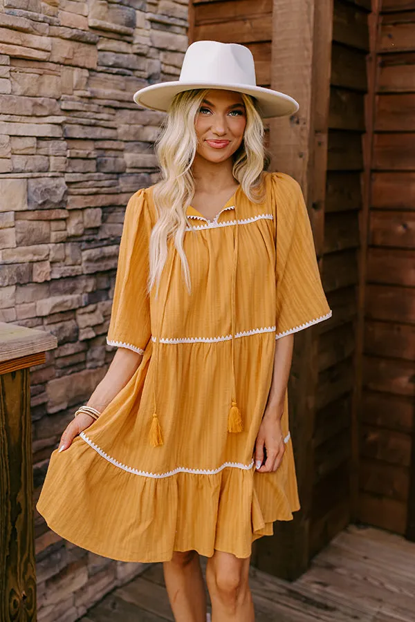 Simply Lovely Tiered Mini Dress in Mustard sold by Impressions product image thumbnail 3