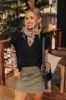 Block Party Chic Knit Top in Black sold by Impressions