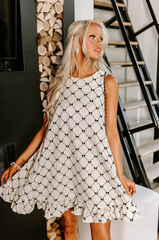 Composed Charm Mini Dress in Cream sold by Impressions
