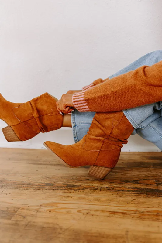 The Emerson Faux Suede Cowboy Boot in Maple sold by Impressions