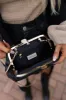 Uptown Chic Faux Leather Purse in Black sold by Impressions