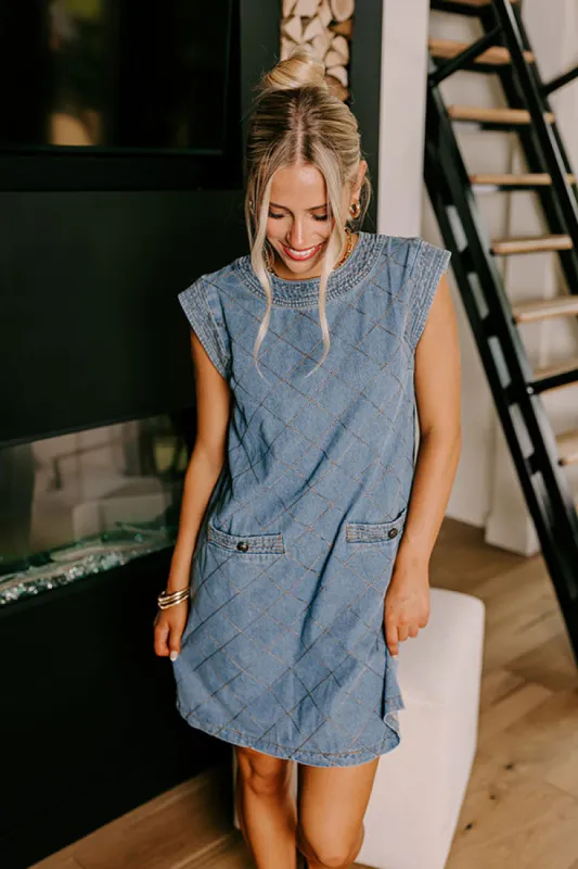 Metropolitan Muse Denim Mini Dress in Medium Wash sold by Impressions