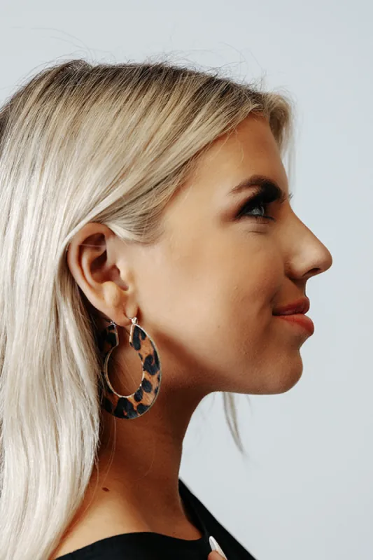 Lovely Leopard Hoop Earrings in Brown sold by Impressions