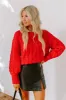 Cabin Parkway Cable Knit Sweater in Red sold by Impressions