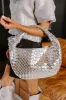 Feeling Glam Woven Metallic Tote in Silver sold by Impressions