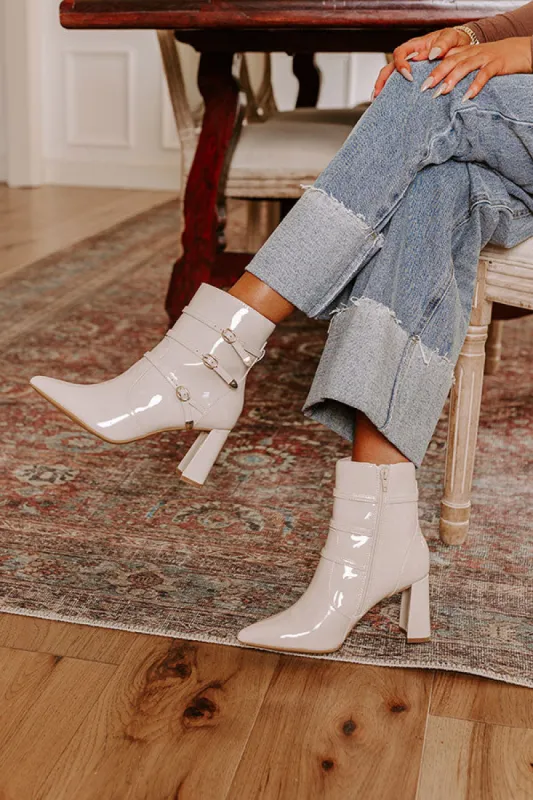 The Claire Patent Bootie sold by Impressions